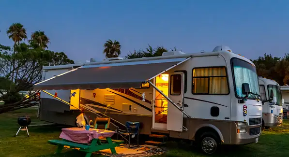 Night view of a RV parked at a campsite